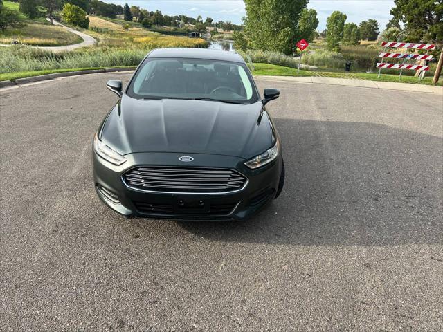 used 2015 Ford Fusion car, priced at $11,999