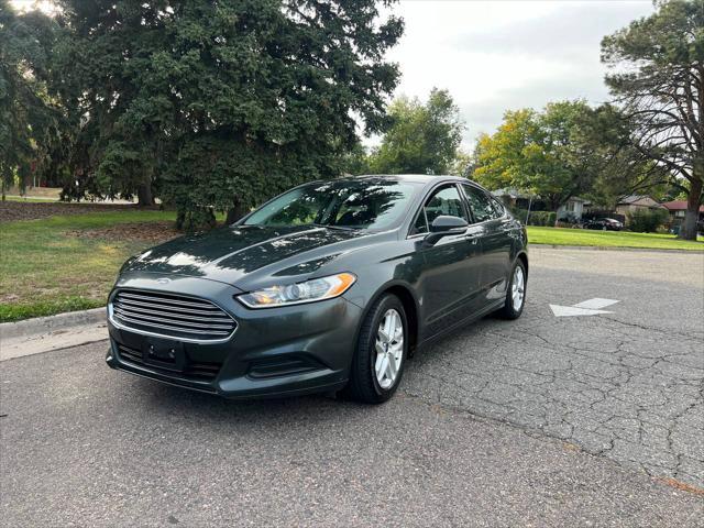 used 2015 Ford Fusion car, priced at $11,999