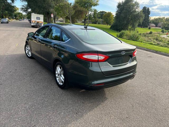 used 2015 Ford Fusion car, priced at $11,999