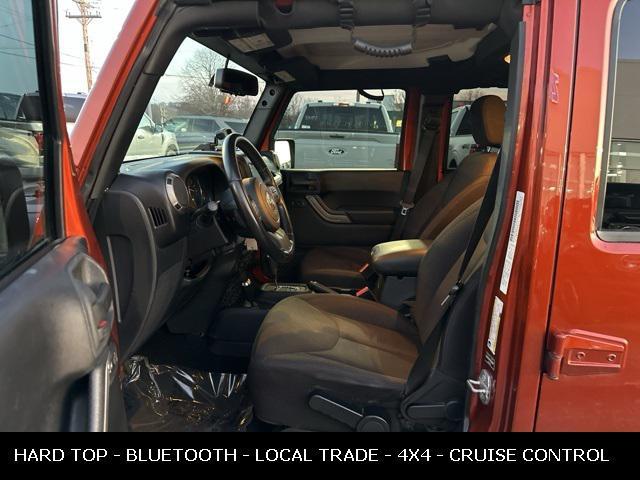 used 2014 Jeep Wrangler Unlimited car, priced at $13,994