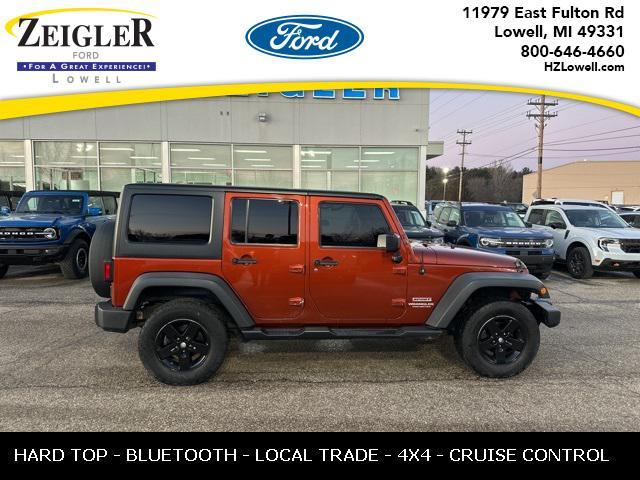 used 2014 Jeep Wrangler Unlimited car, priced at $14,694