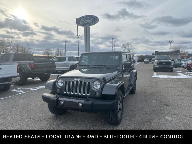 used 2016 Jeep Wrangler Unlimited car, priced at $19,694