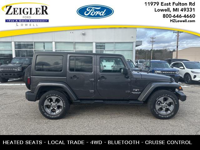 used 2016 Jeep Wrangler Unlimited car, priced at $19,694