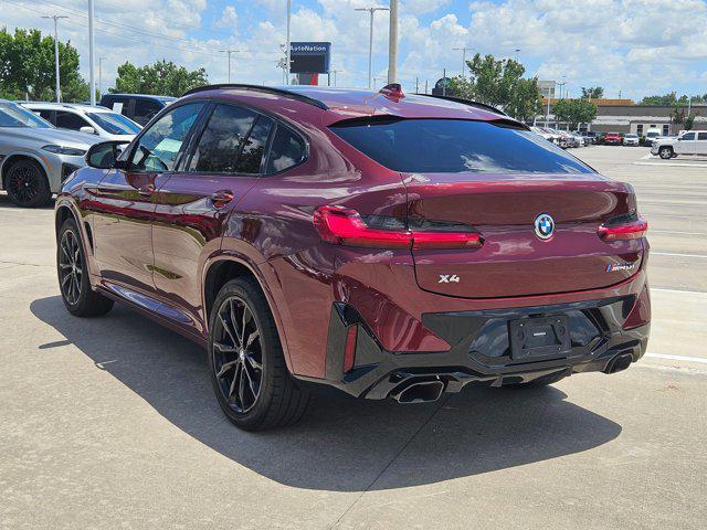 used 2023 BMW X4 car, priced at $56,491
