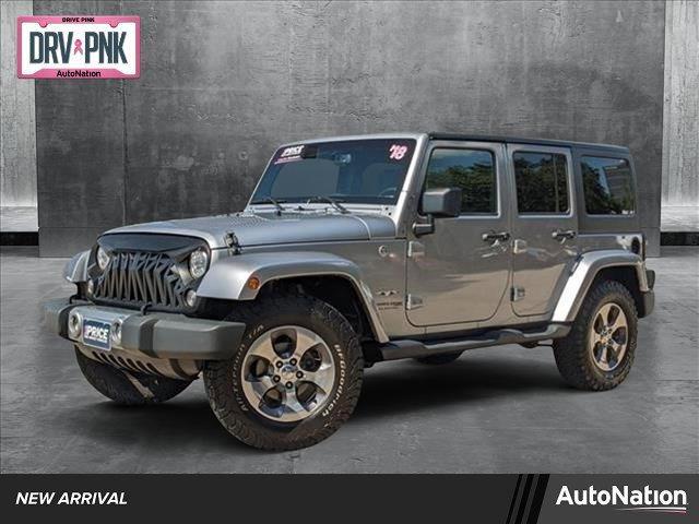 used 2018 Jeep Wrangler JK Unlimited car, priced at $23,869