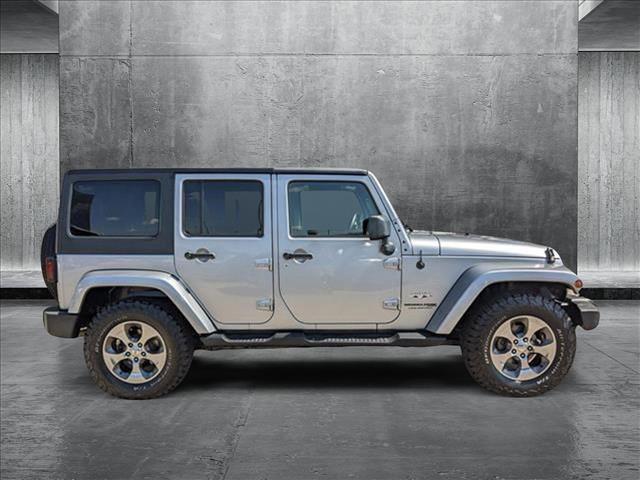 used 2018 Jeep Wrangler JK Unlimited car, priced at $23,869