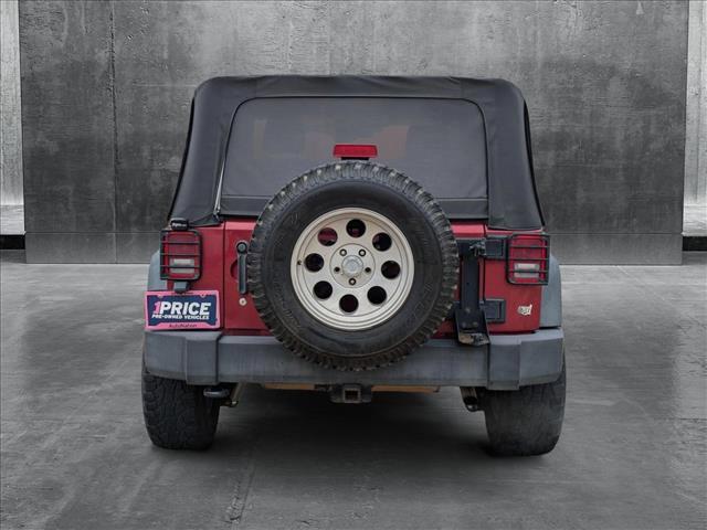 used 2012 Jeep Wrangler car, priced at $12,391