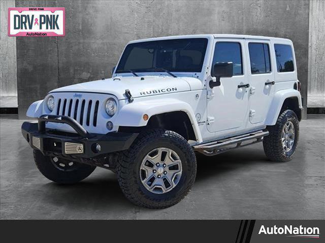 used 2017 Jeep Wrangler Unlimited car, priced at $23,952