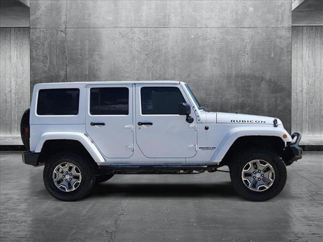 used 2017 Jeep Wrangler Unlimited car, priced at $24,952