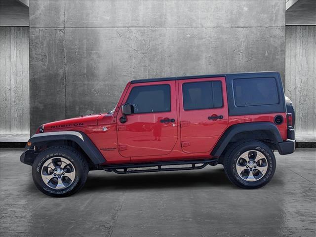 used 2016 Jeep Wrangler Unlimited car, priced at $25,657