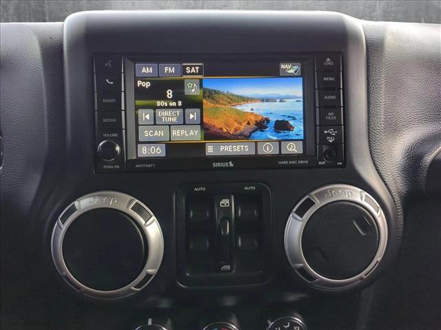 used 2016 Jeep Wrangler Unlimited car, priced at $22,391