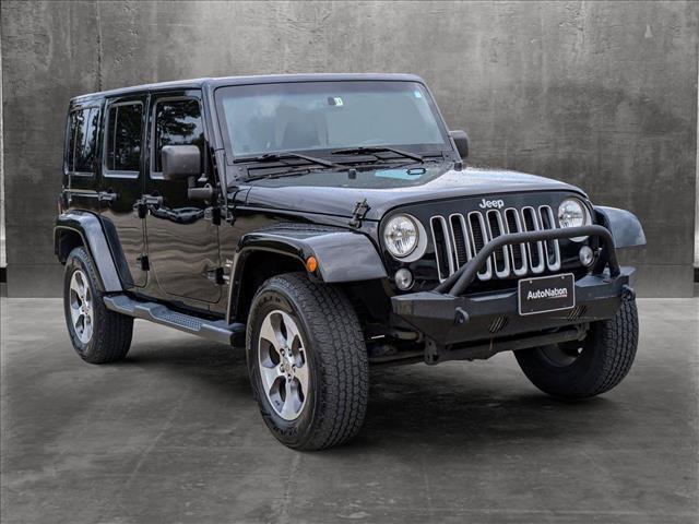 used 2016 Jeep Wrangler Unlimited car, priced at $20,952