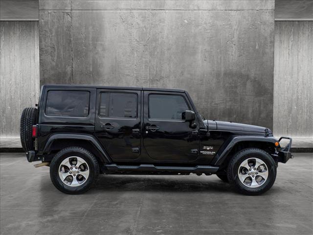 used 2016 Jeep Wrangler Unlimited car, priced at $18,991