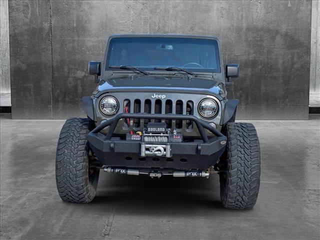 used 2015 Jeep Wrangler Unlimited car, priced at $21,991