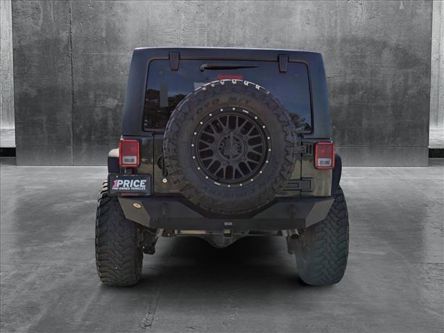 used 2015 Jeep Wrangler Unlimited car, priced at $21,991