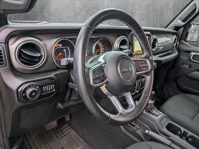 used 2021 Jeep Wrangler Unlimited car, priced at $31,592