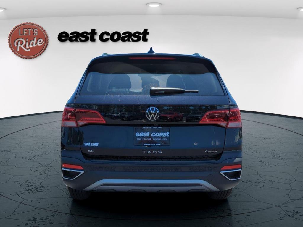 used 2024 Volkswagen Taos car, priced at $31,000