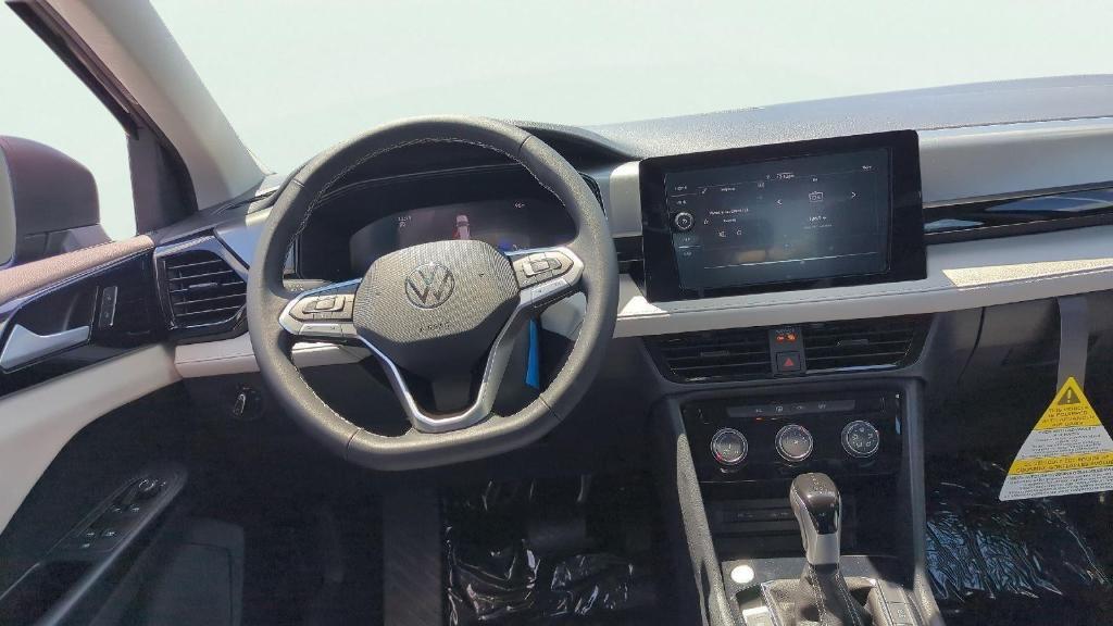 new 2025 Volkswagen Taos car, priced at $26,213