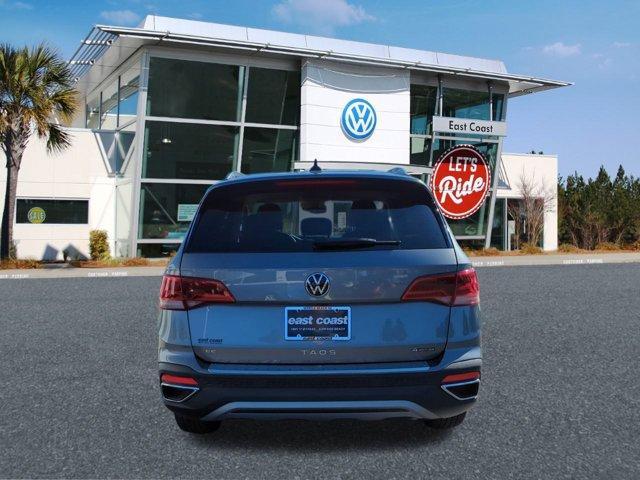 used 2024 Volkswagen Taos car, priced at $33,668