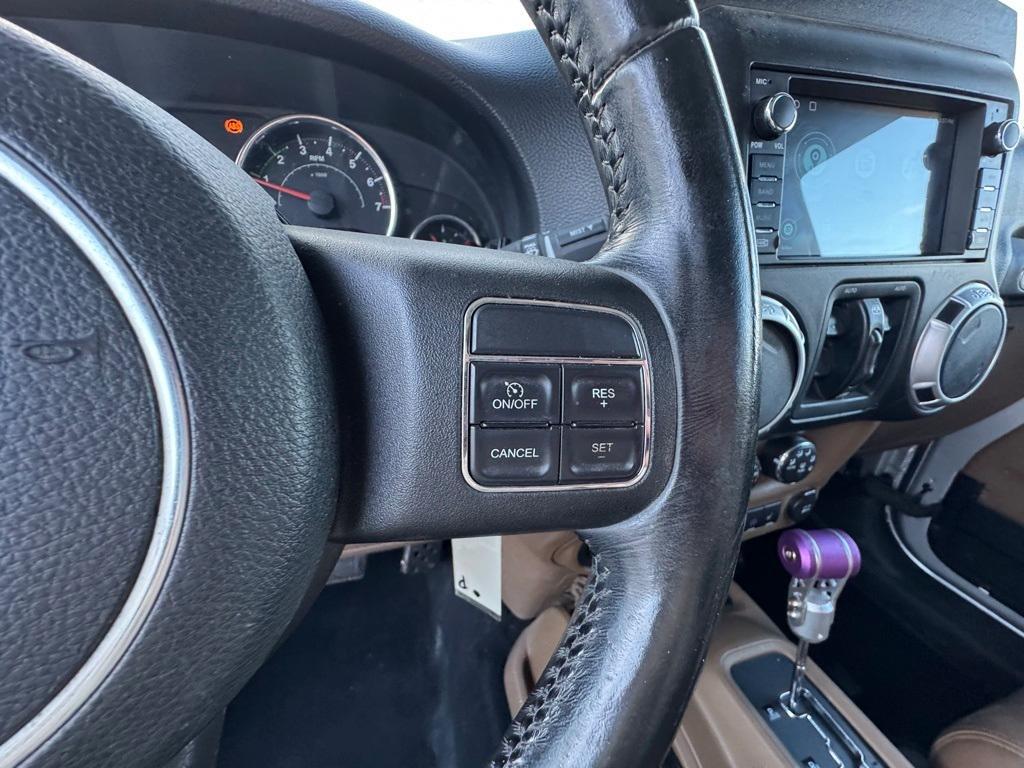 used 2012 Jeep Wrangler Unlimited car, priced at $12,800