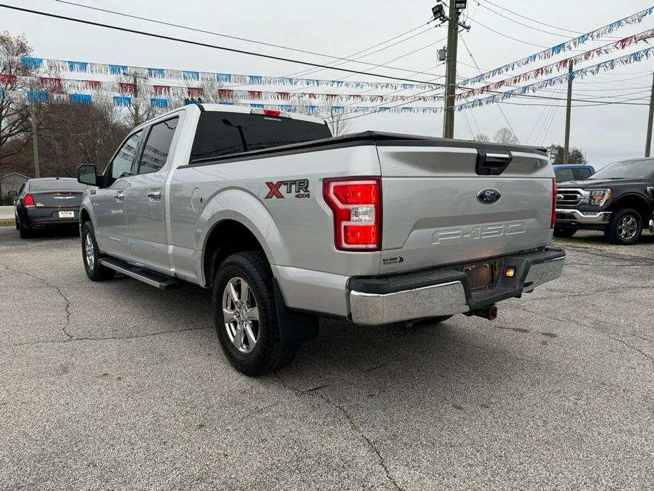 used 2018 Ford F-150 car, priced at $25,151