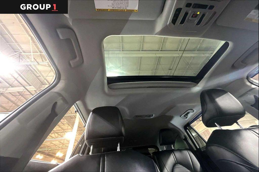 used 2022 Toyota Highlander Hybrid car, priced at $35,997