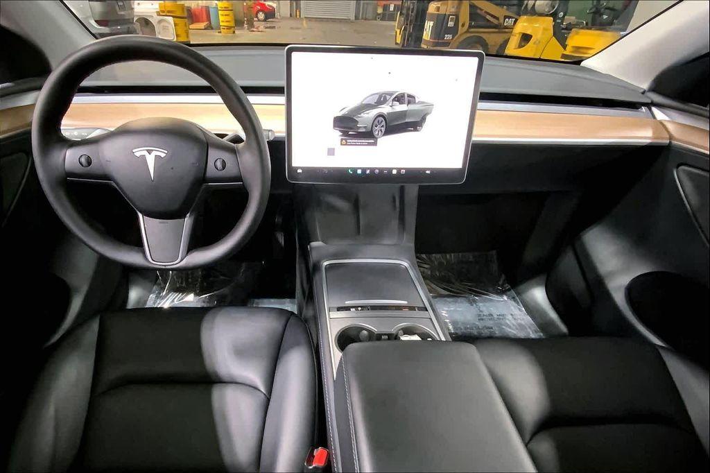 used 2025 Tesla Model Y car, priced at $36,990