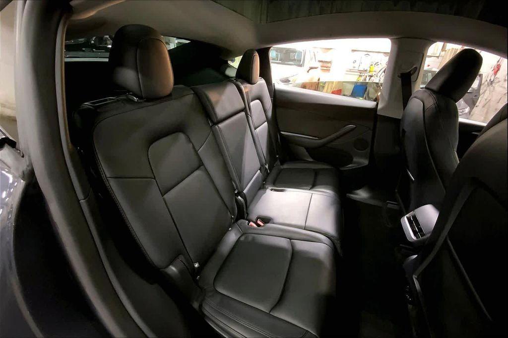 used 2025 Tesla Model Y car, priced at $36,990