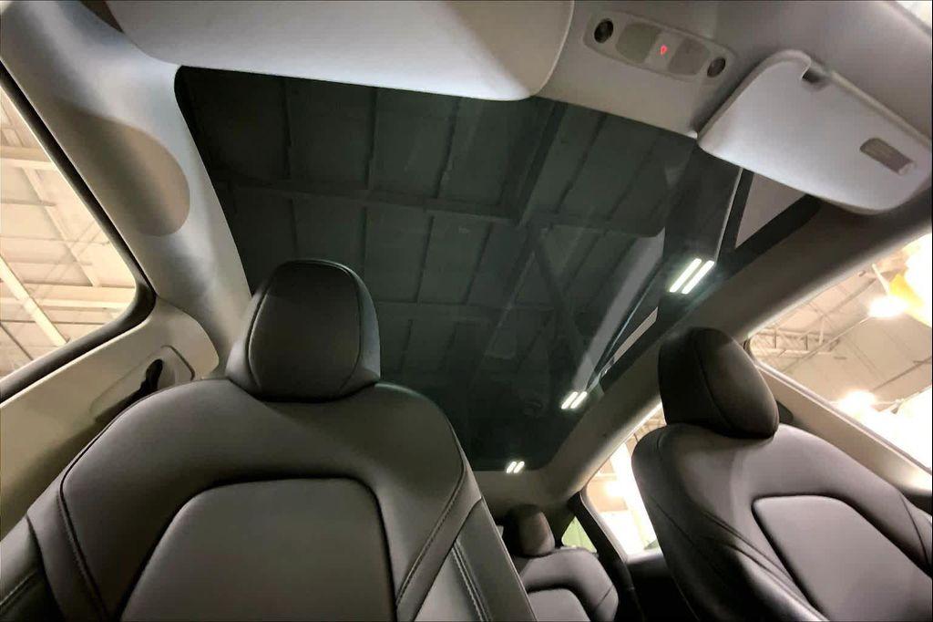 used 2025 Tesla Model Y car, priced at $36,990