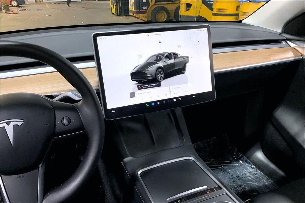 used 2025 Tesla Model Y car, priced at $36,990