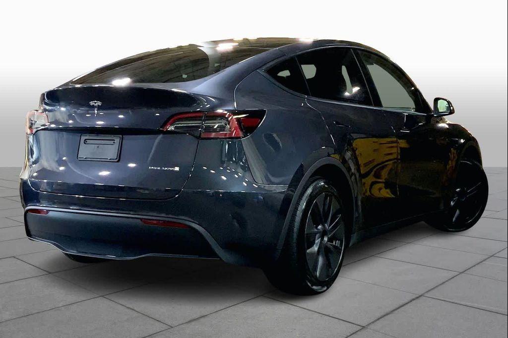 used 2025 Tesla Model Y car, priced at $36,990
