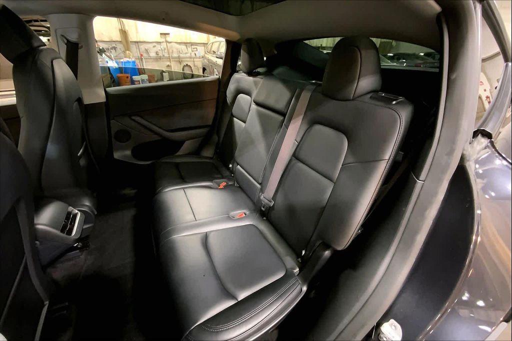 used 2025 Tesla Model Y car, priced at $36,990