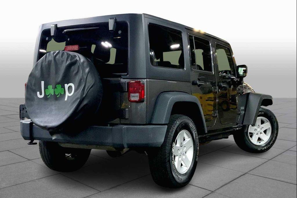 used 2018 Jeep Wrangler JK Unlimited car, priced at $25,891