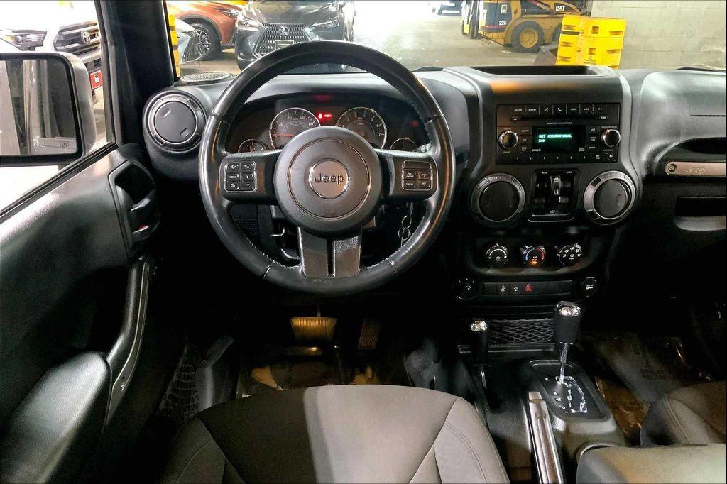 used 2018 Jeep Wrangler JK Unlimited car, priced at $25,891