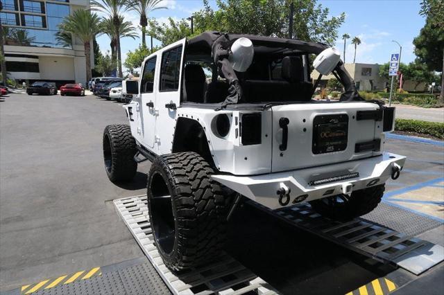 used 2017 Jeep Wrangler Unlimited car, priced at $55,888