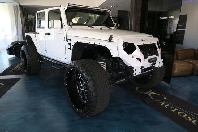 used 2017 Jeep Wrangler Unlimited car, priced at $62,888