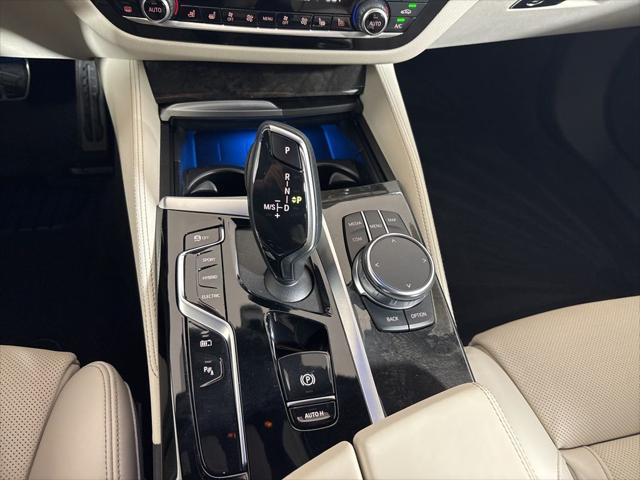 used 2022 BMW 530e car, priced at $39,262
