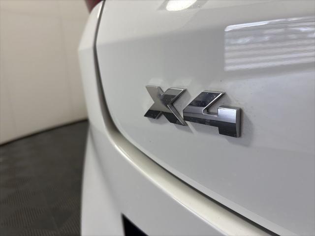 used 2024 BMW X4 car, priced at $63,262