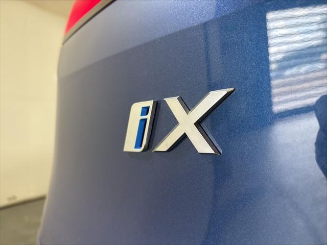 new 2025 BMW iX car, priced at $96,475