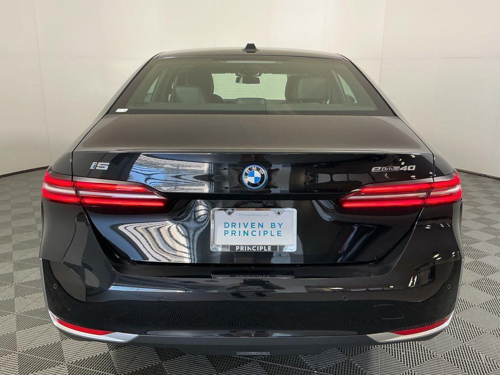 used 2025 BMW i5 car, priced at $58,575