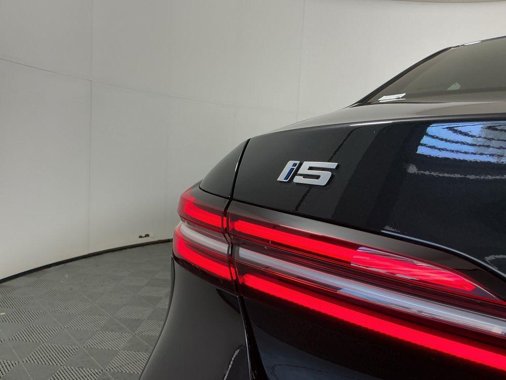 used 2025 BMW i5 car, priced at $58,575