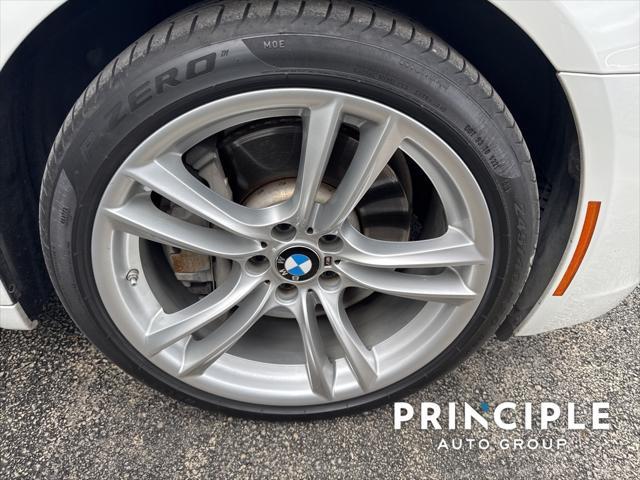 used 2013 BMW 750 car, priced at $17,462