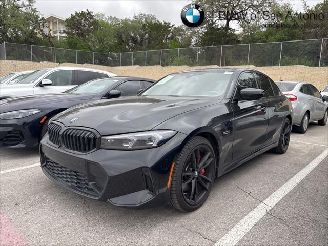 used 2023 BMW 330e car, priced at $36,962