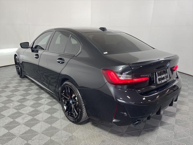 used 2023 BMW 330e car, priced at $35,962