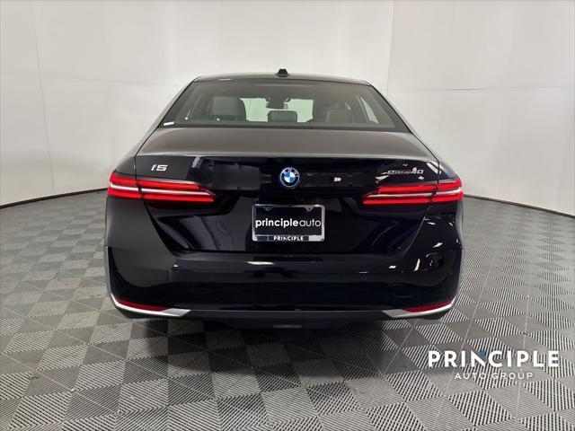 used 2024 BMW i5 car, priced at $63,460