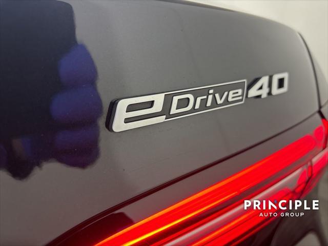 used 2024 BMW i5 car, priced at $63,460