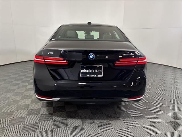 used 2024 BMW i5 car, priced at $60,960