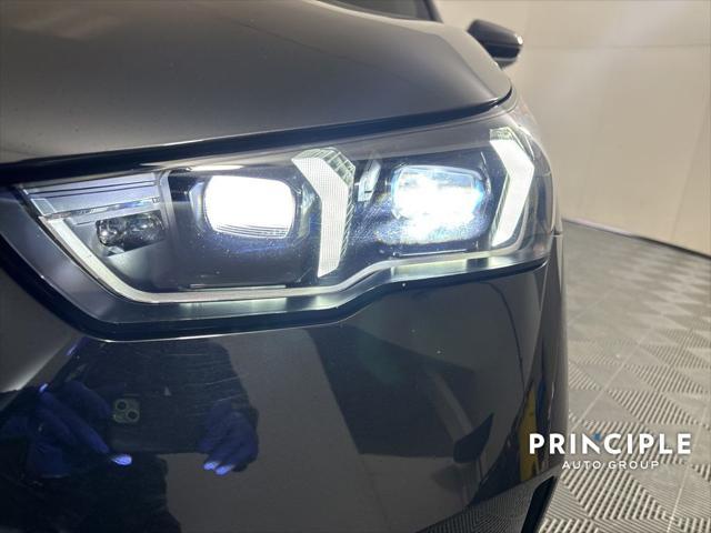 used 2024 BMW i5 car, priced at $63,460