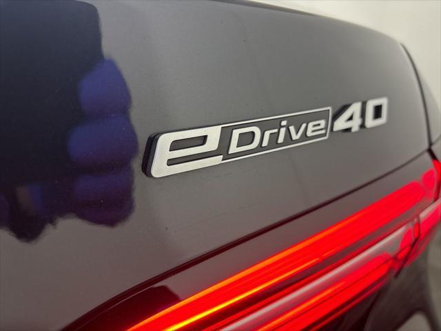 used 2024 BMW i5 car, priced at $60,960