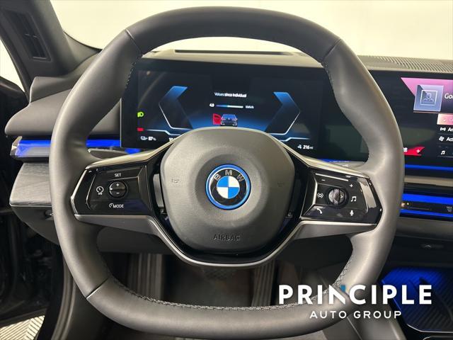 used 2024 BMW i5 car, priced at $66,260